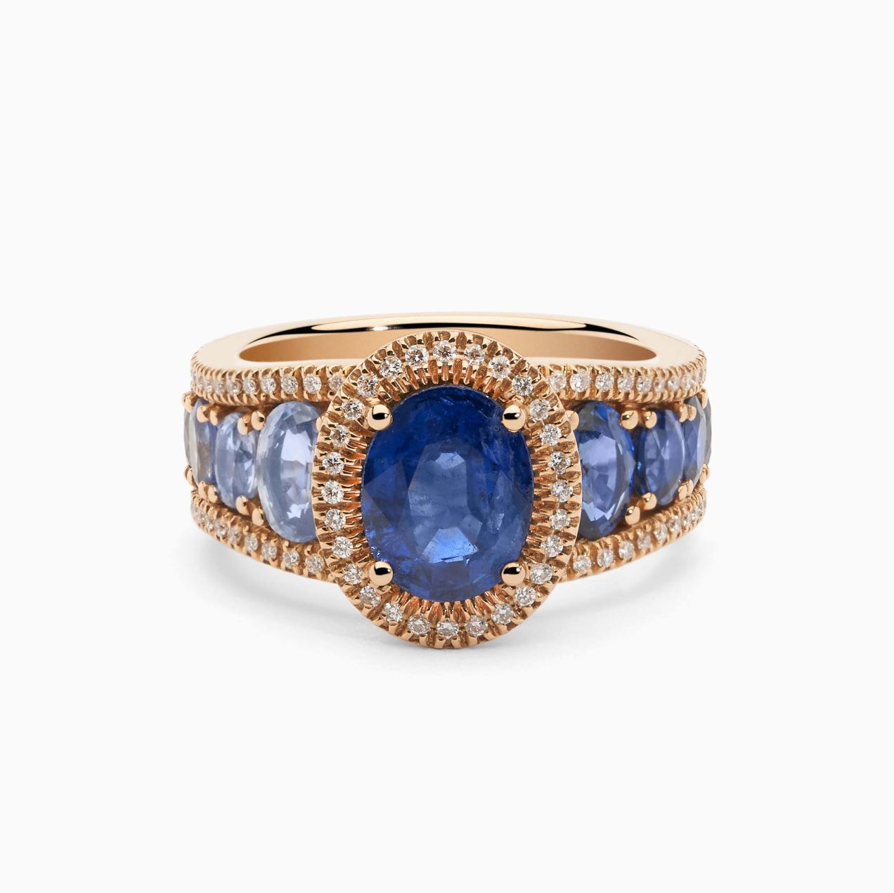 Solitaire ring in rose gold with central blue sapphire