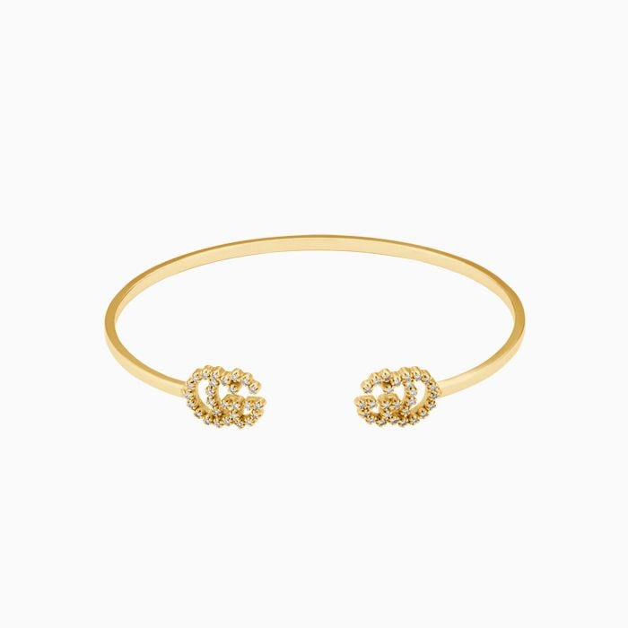 Gucci GG Running bracelet in yellow gold with diamonds 