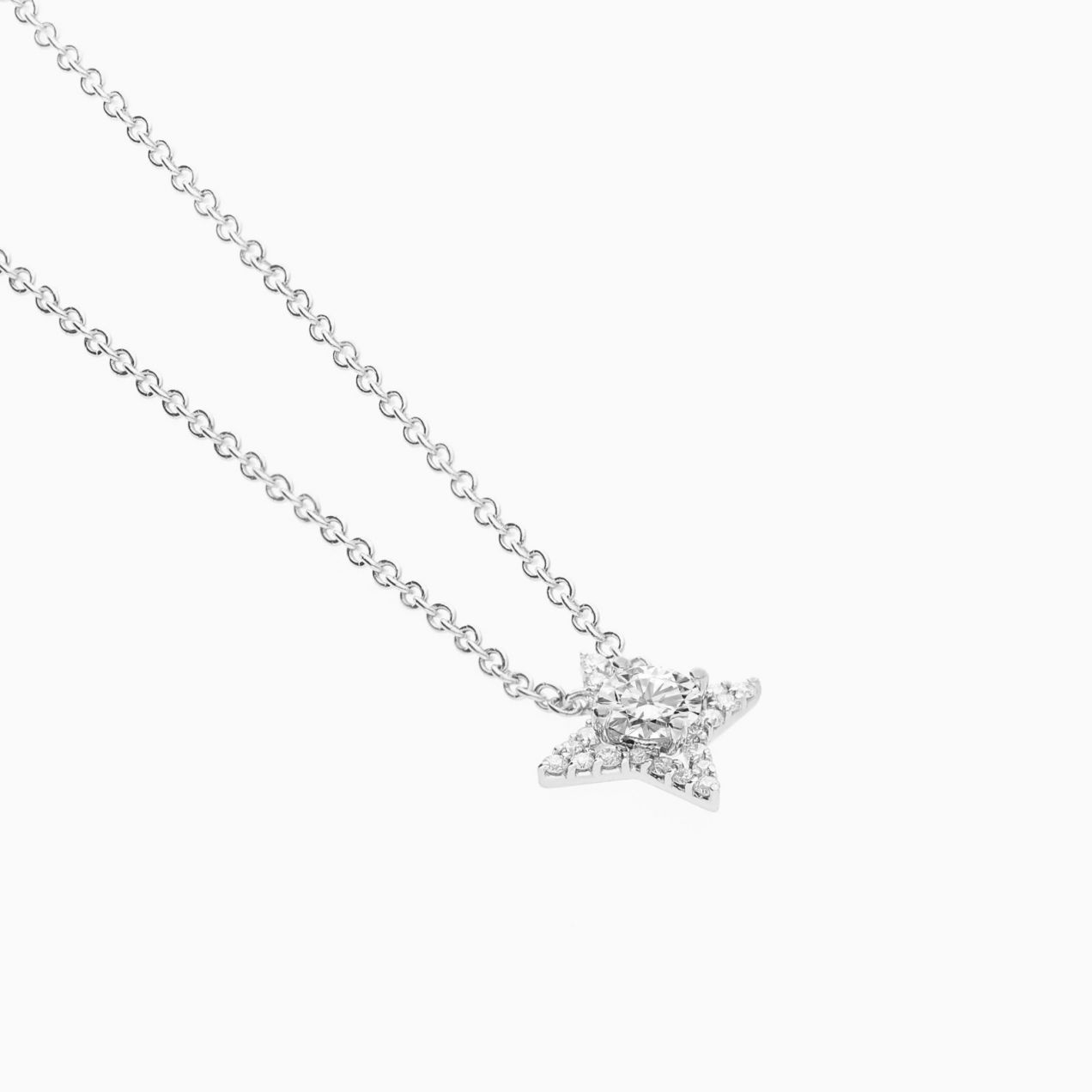 Star pendant in white gold with central diamond and diamond halo