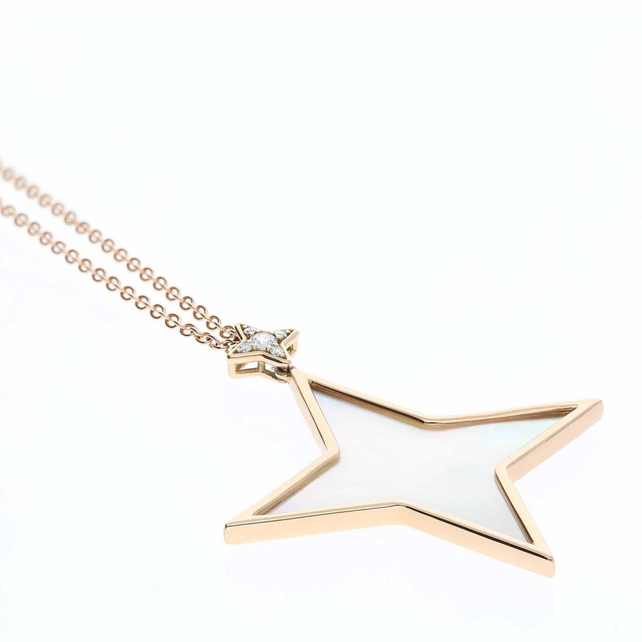 Rose gold star pendant with central pearl and diamonds
