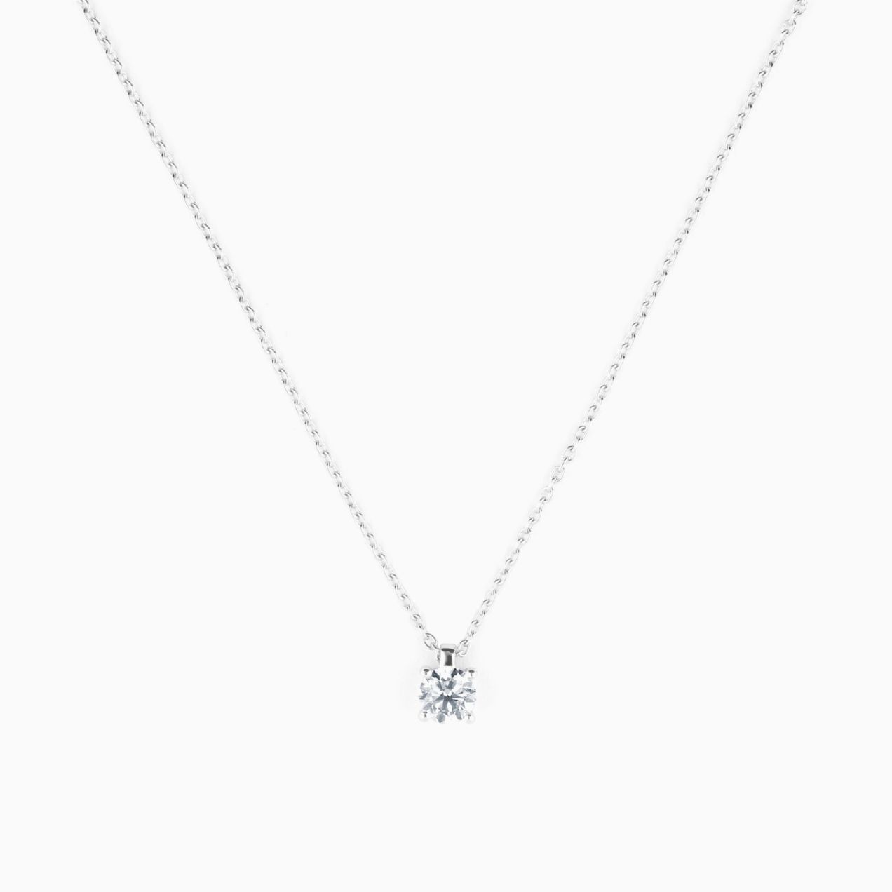Colgante solitario de oro blanco con diamante 