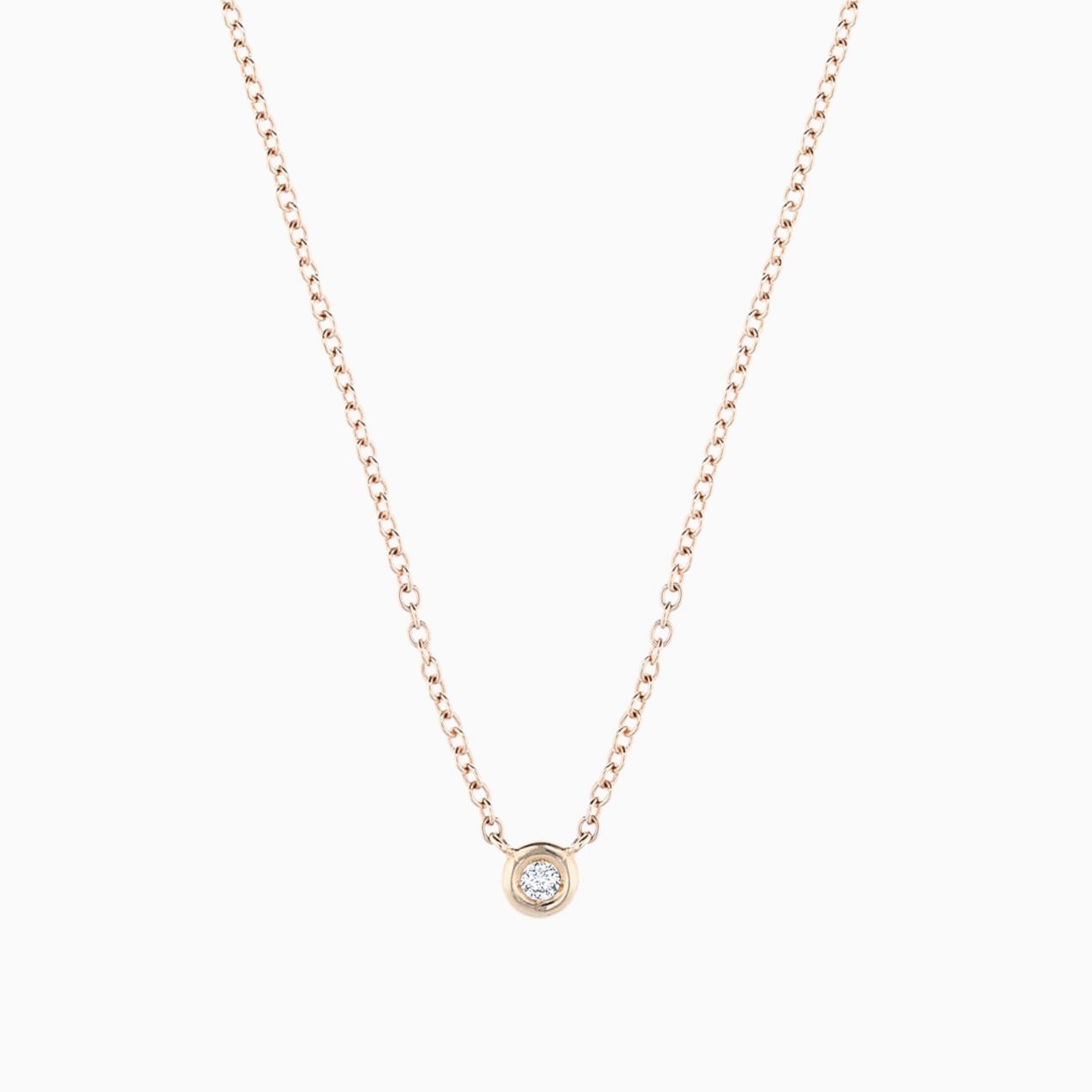 Colgante solitario de oro rosa con diamante