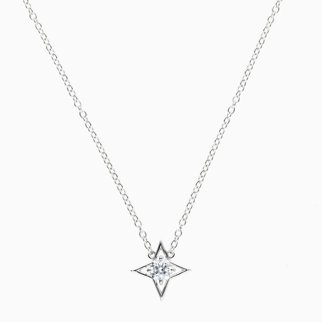Star solitaire pendant in white gold with a diamond
