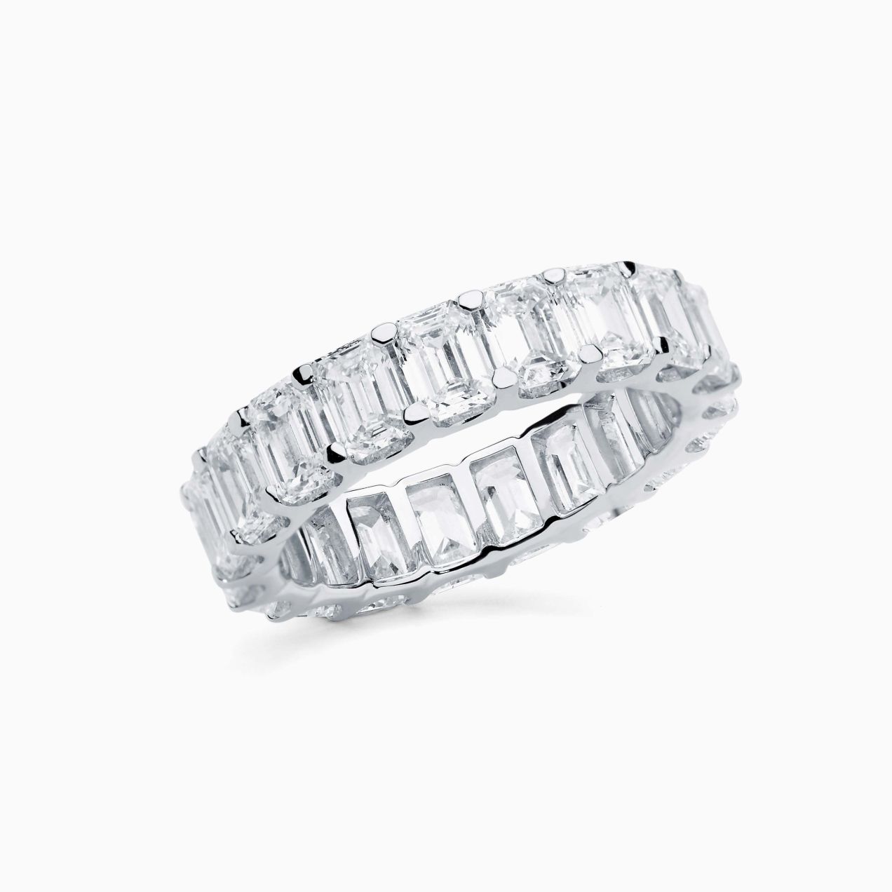 White gold band ring with emerald-cut diamonds