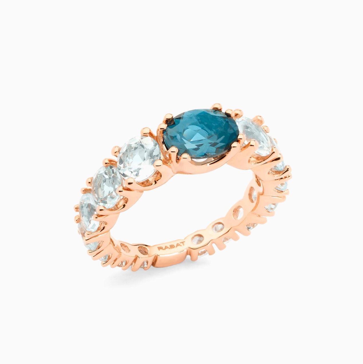 Rose Gold ring with London topacies gems and arm with sky topacies