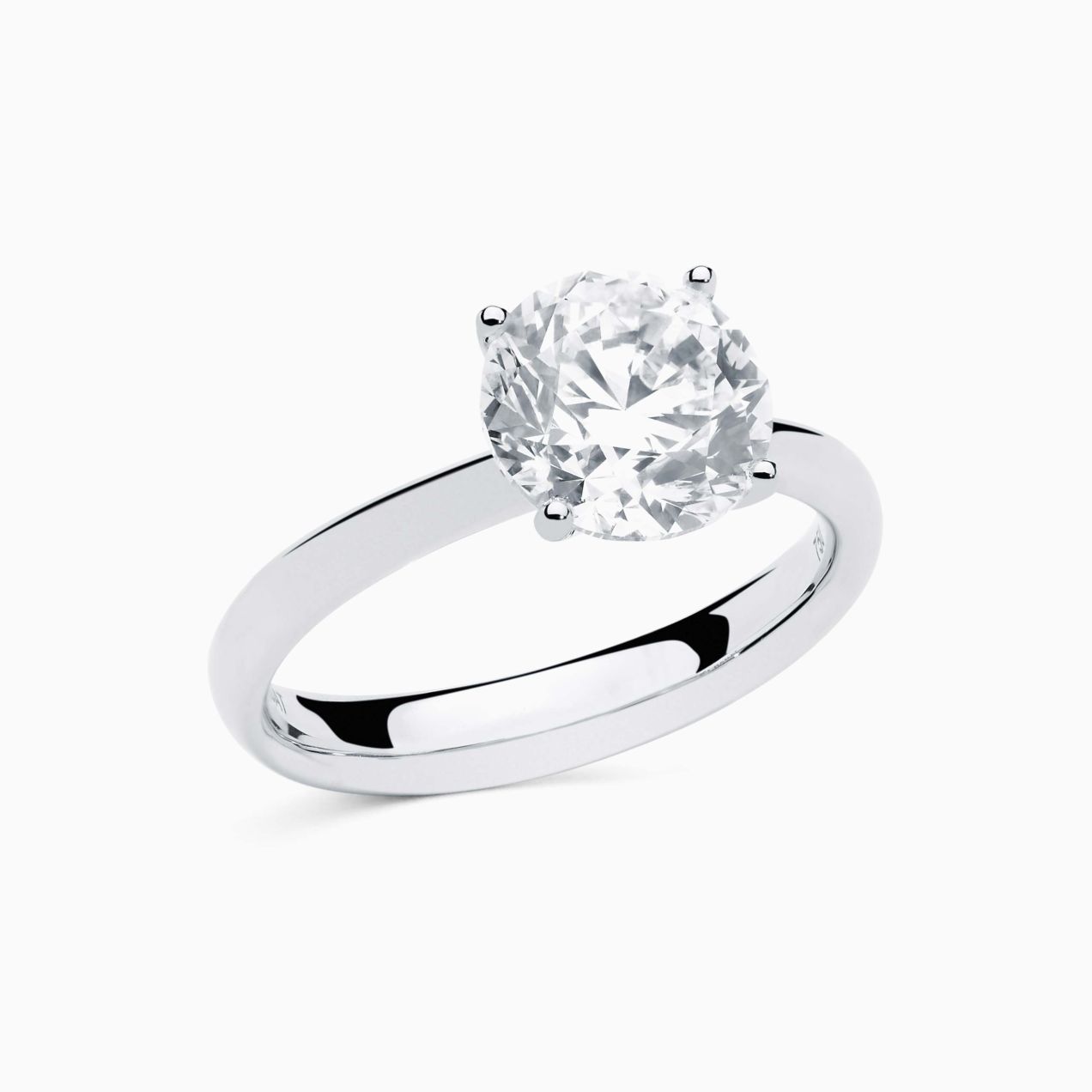 White gold engagement ring with central diamond