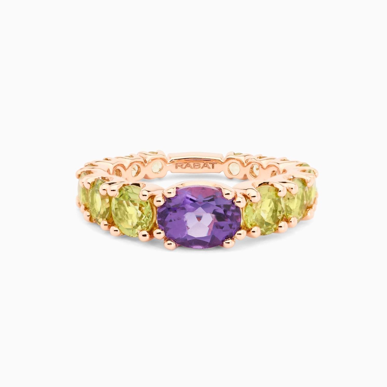 Rose gold ring with central amethyst and peridota arm