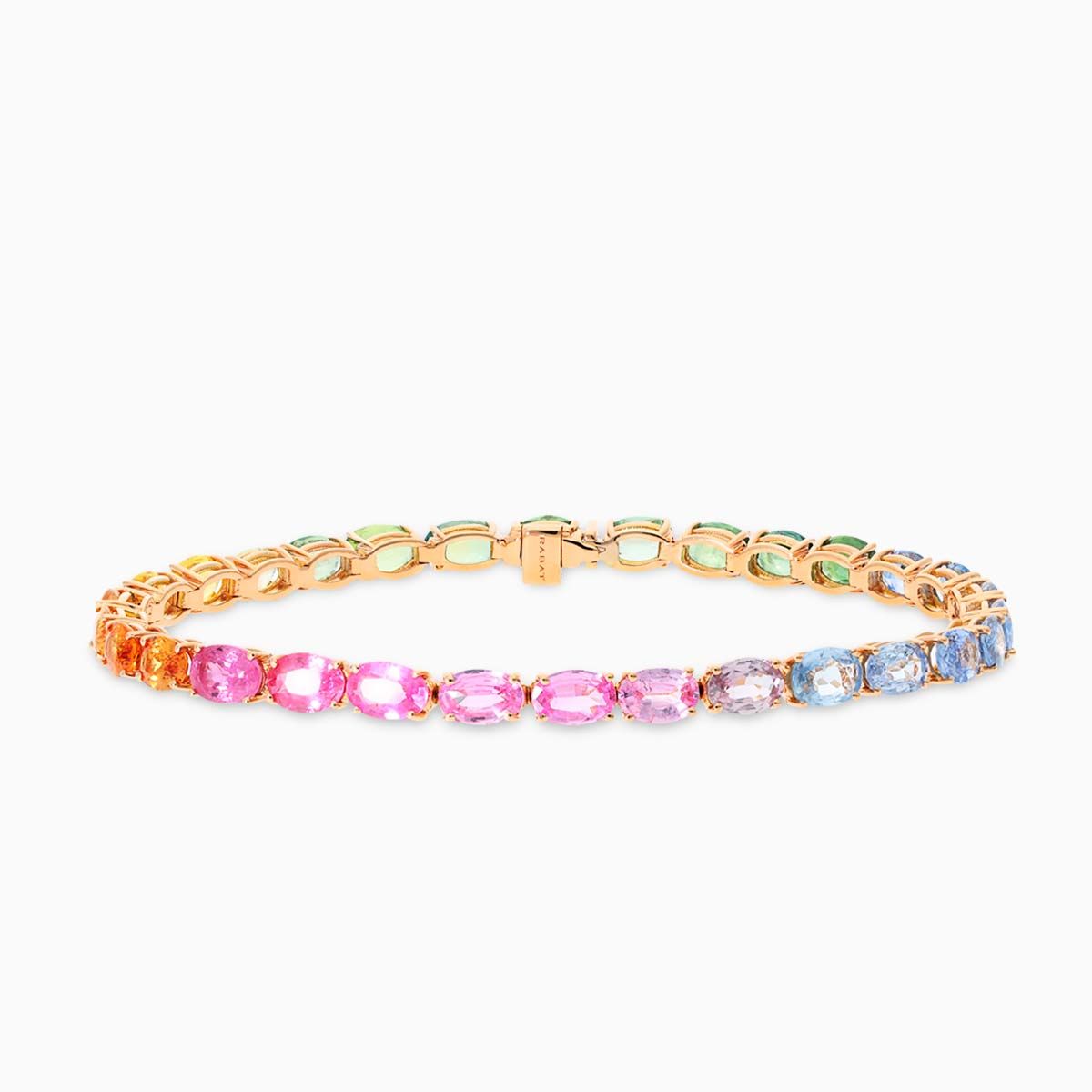 Pulsera rivière de oro rosa con zafiros multicolor talla oval