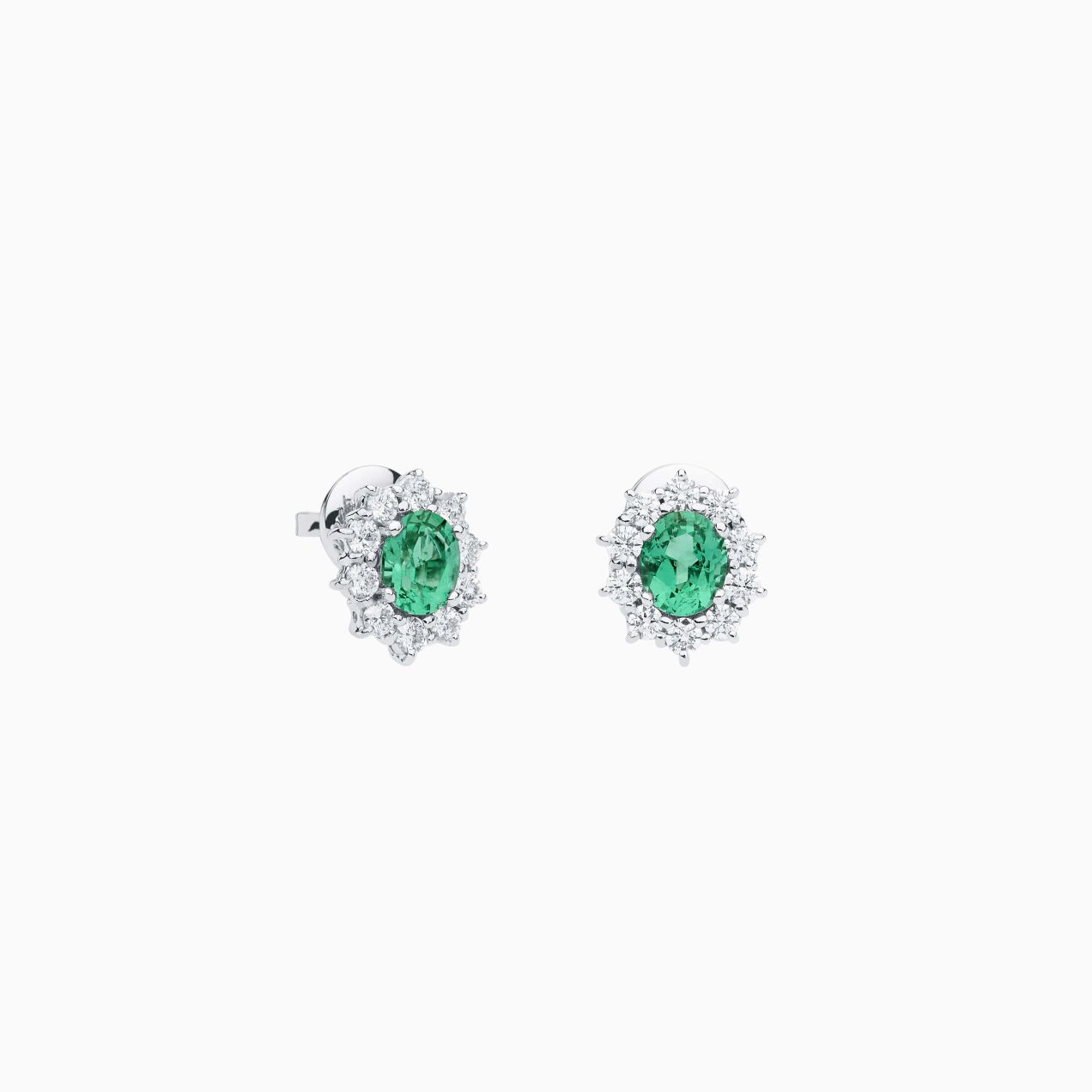 White gold earrings with emeralds and diamonds