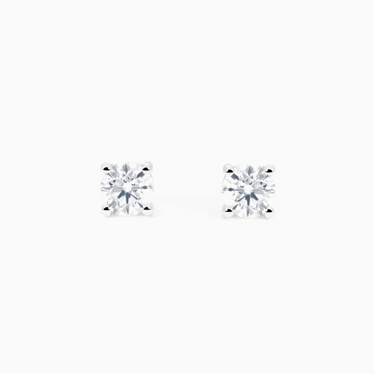 Pendientes dormilonas de oro blanco con diamantes