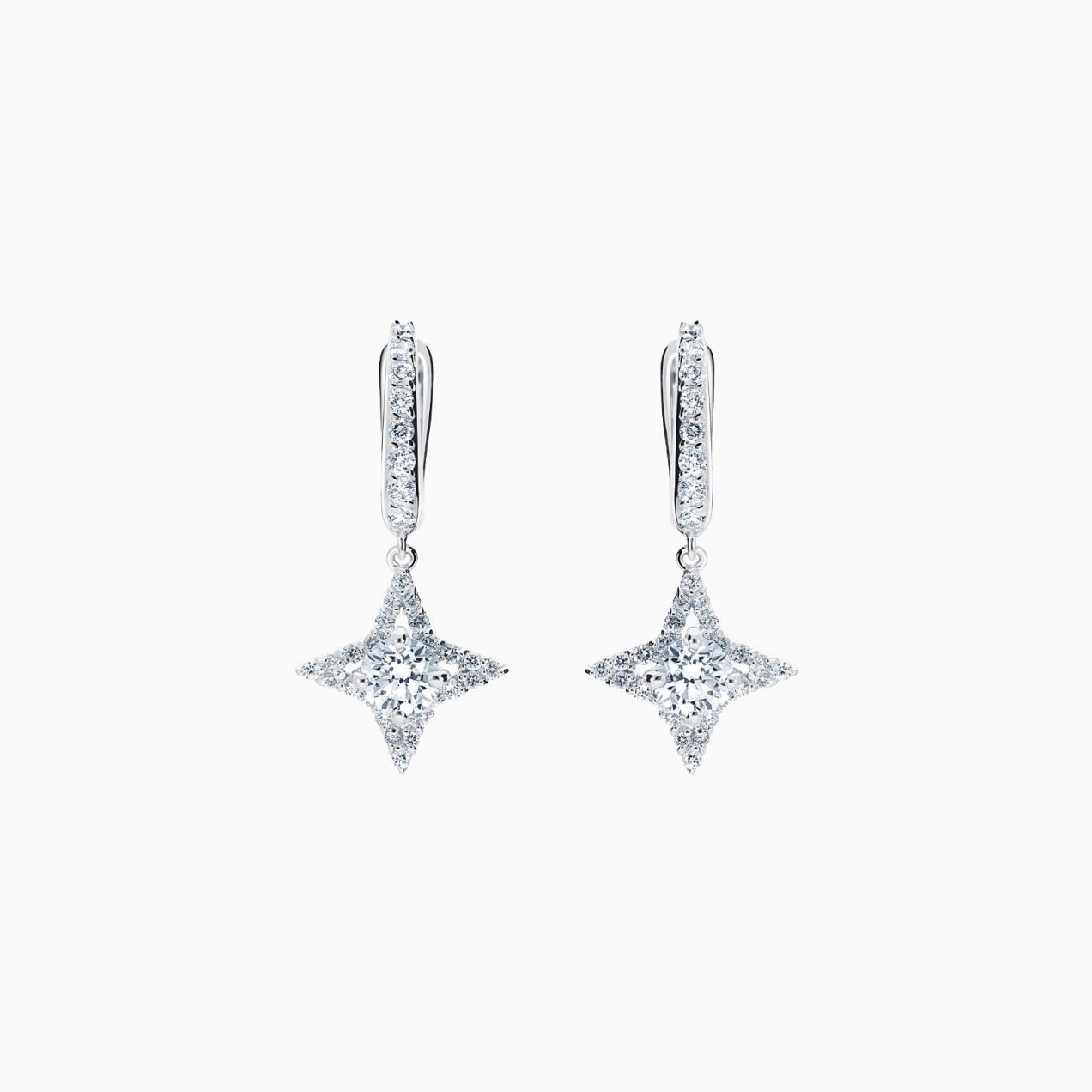 Star earrings in white gold with central diamond and diamond halo