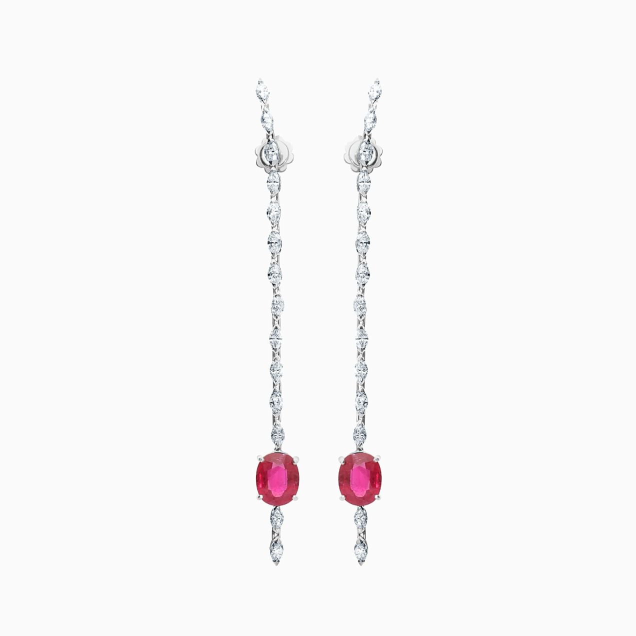 Long white gold earrings with diamonds and red rubies