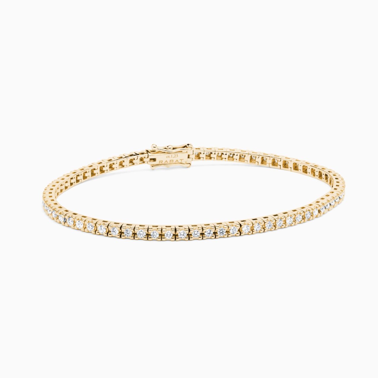 Yellow gold riviere bracelet with diamonds