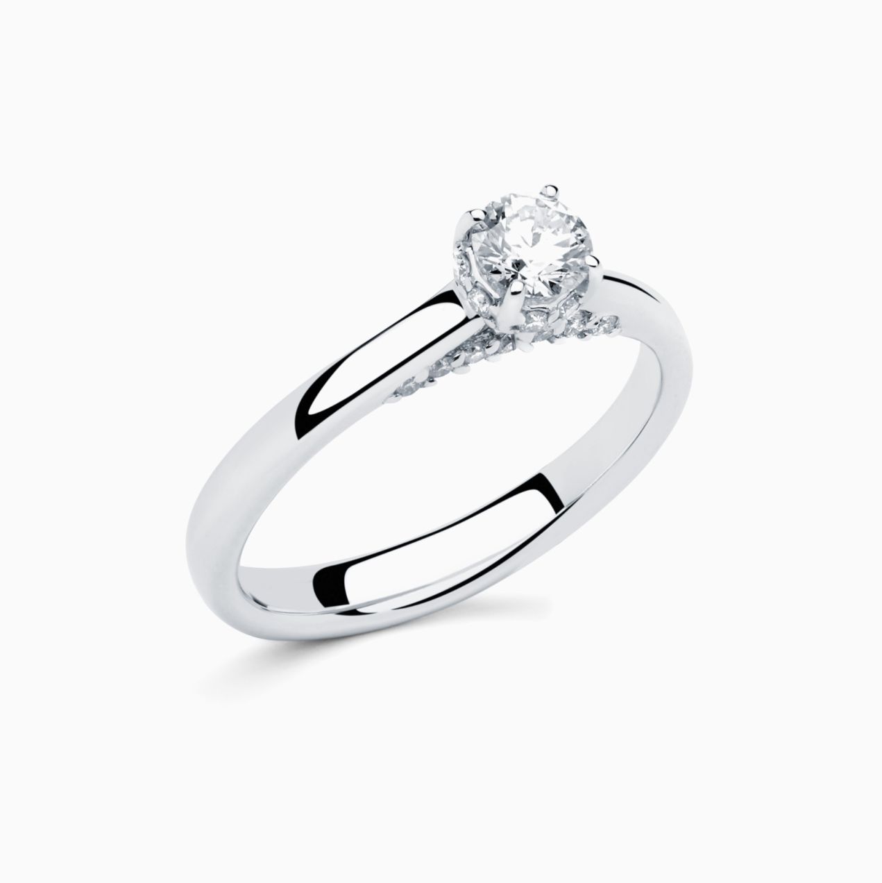 Anillo solitario de compromiso de oro blanco con diamante central y corona de diamantes
