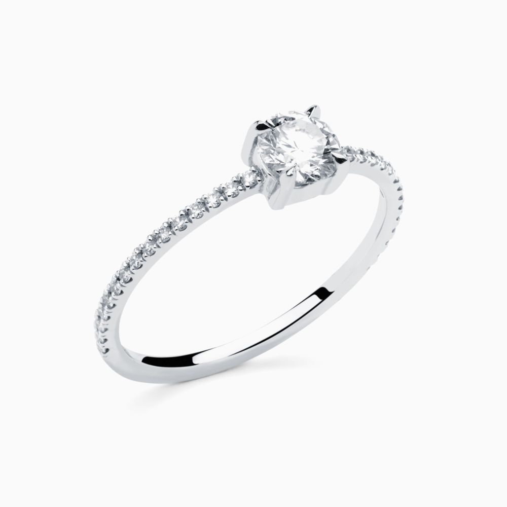 Anillo solitario con diamante central y brazo de diamantes Rabat Poetic