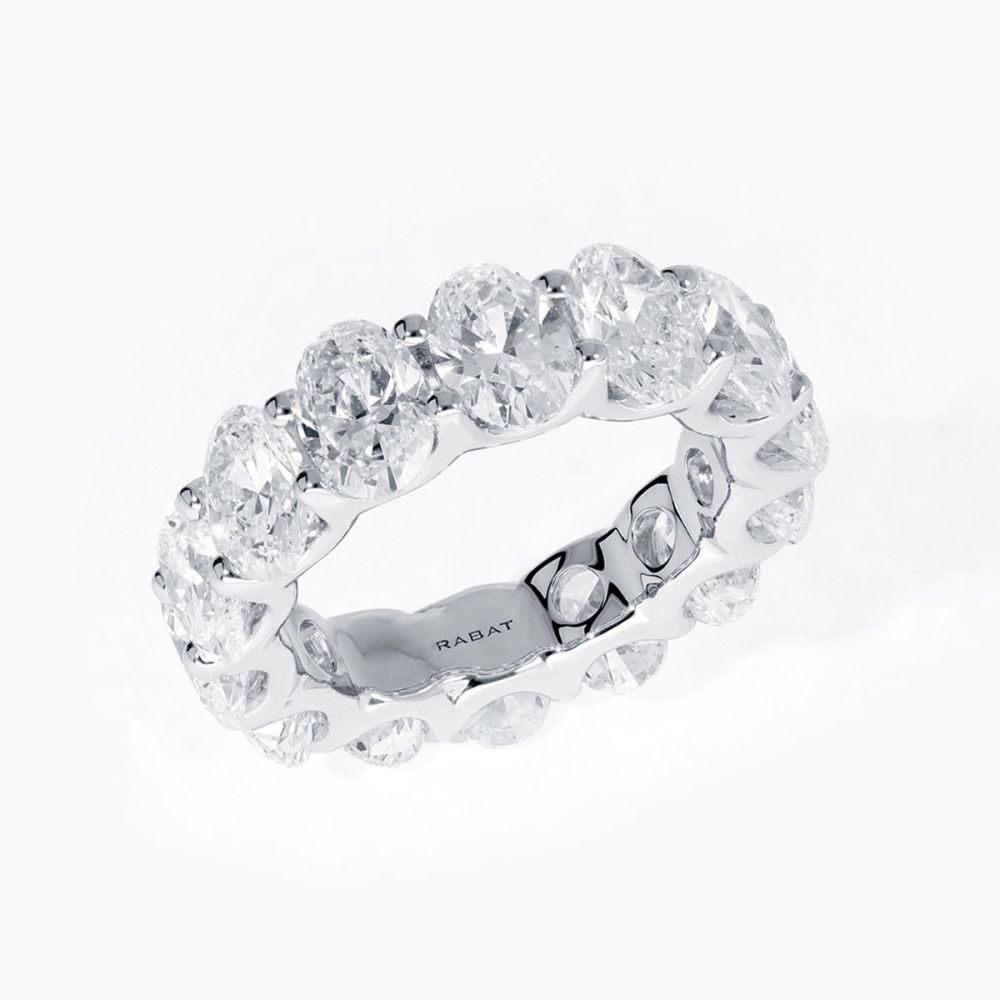 White gold wedding band with oval-cut diamonds