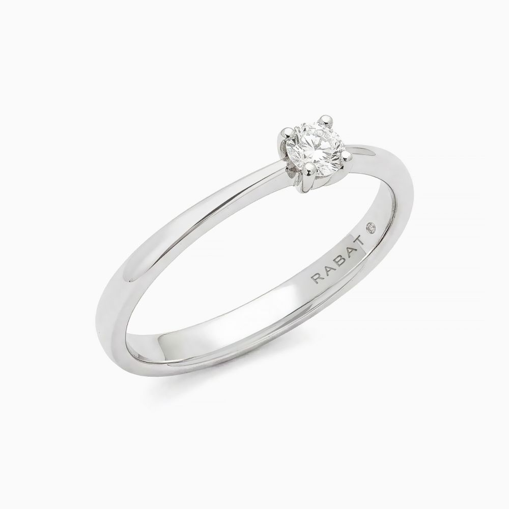 Anillo solitario de compromiso de oro blanco con diamante central 0.15 en Joyería RABAT