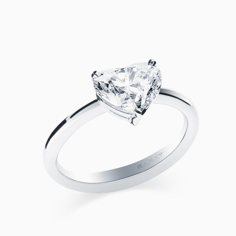 Platinum solitaire ring with heart-cut diamond