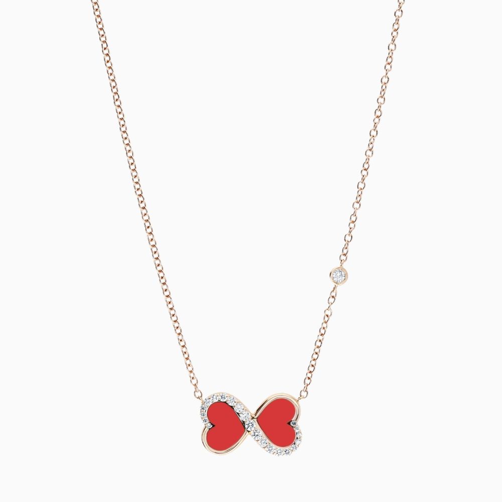 Infinity symbol pendant in rose gold with heart-cut coral and diamonds