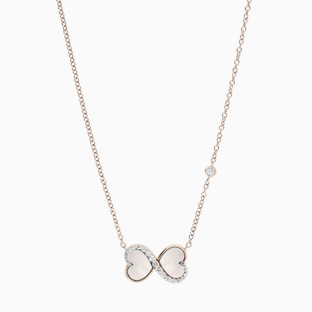 Infinity symbol pendant in rose gold with heart-cut mother of pearl and diamonds