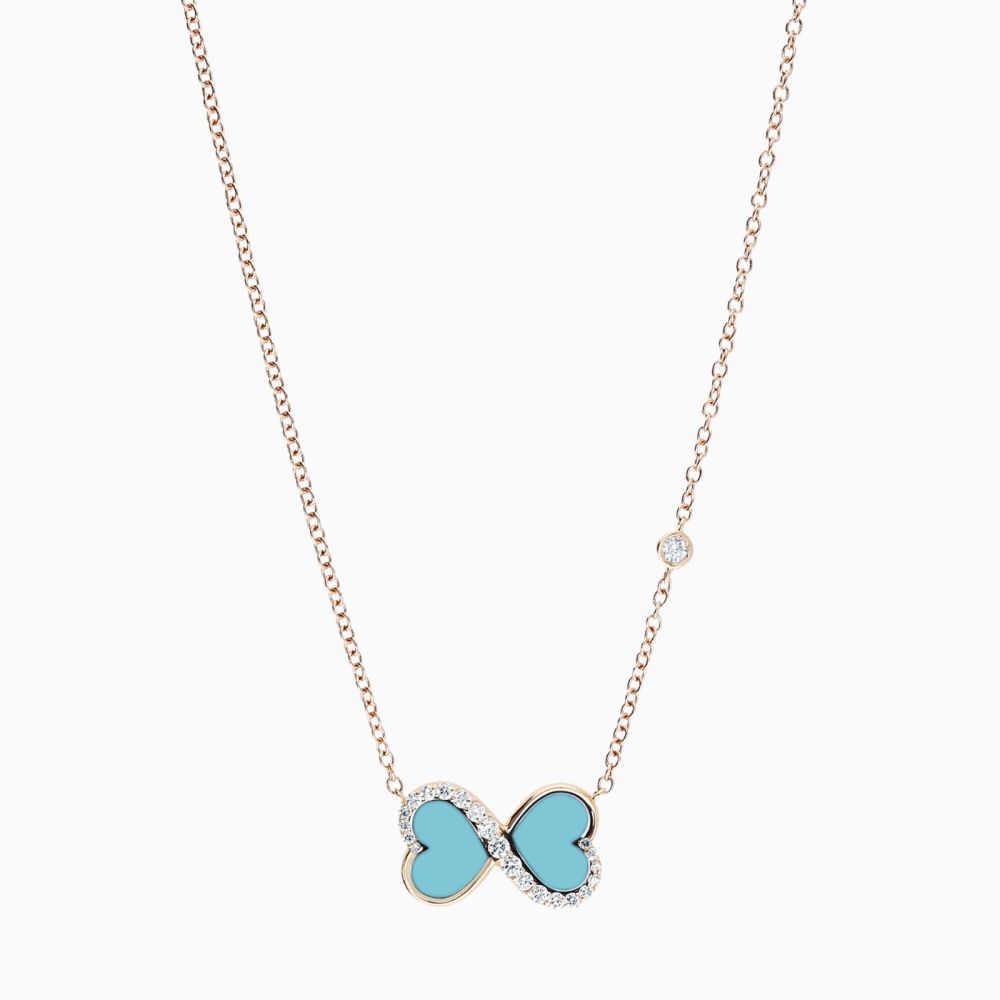 Rose gold infinity symbol pendant with heart-cut turquoise and diamonds