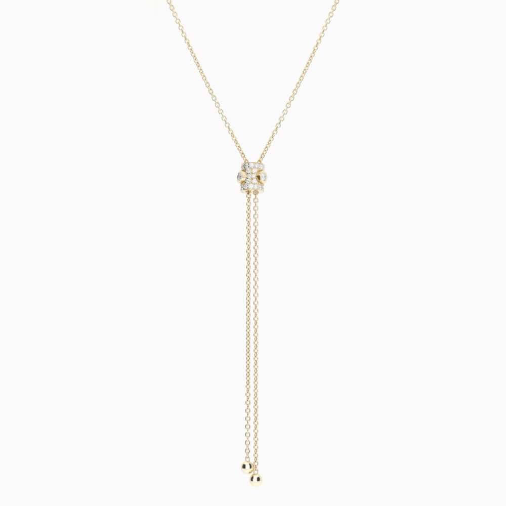 Collar estilo corbata de oro amarillo con tres diamantes centrales y pavé de diamantes