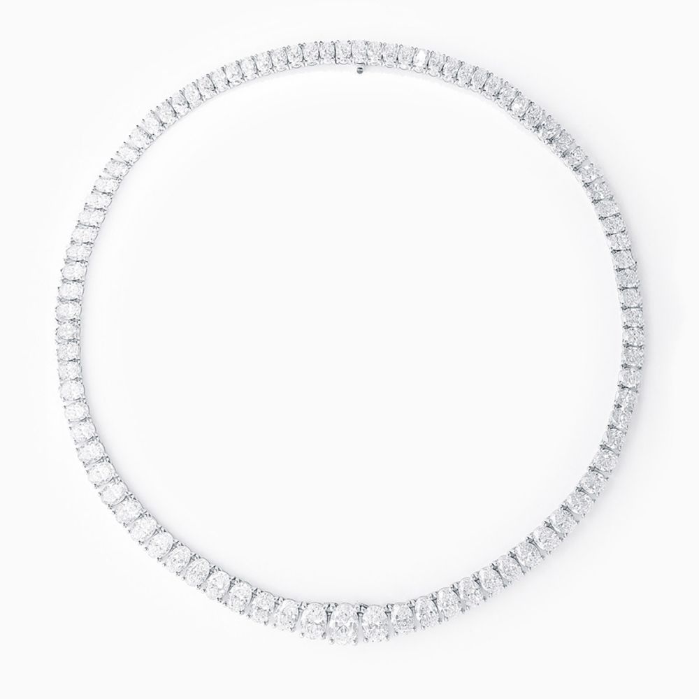 White gold riviere necklace with oval-cut diamonds