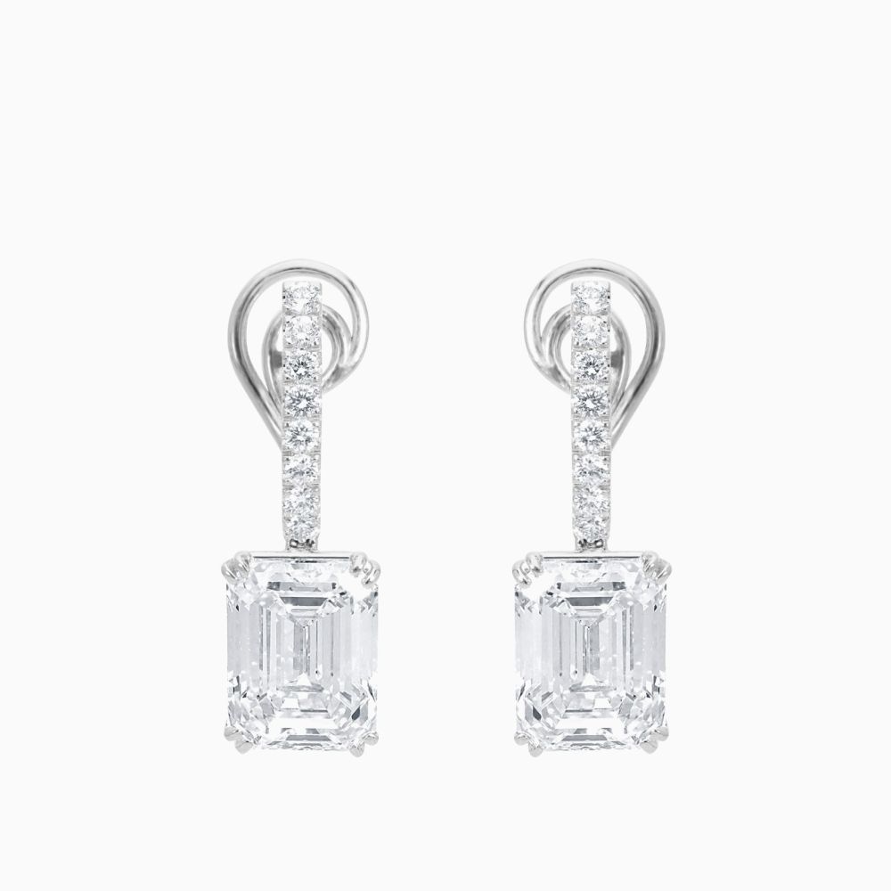 White gold earrings with emerald-cut diamonds and diamonds