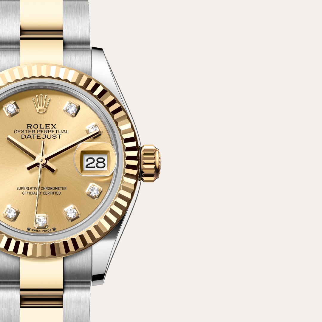 Reloj Rolex Lady-Datejust ref: M279173-0012 con esfera de color Color champagne, engastada de diamantes, con cristal de Zafiro resistente a las rayaduras, lente Cyclops sobre la fecha. Presenta bisel Estriado, corona Enroscada con sistema de doble hermeti 